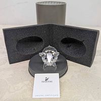 Crystal pig figurine on display base with certificate and foam insert