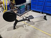 Full view of Northern Lights ARC-102 rowing machine showing flywheel, rail, seat and monitor area