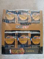 Front of sealed 1992-93 Fleer basketball wax box showing packs through window