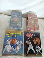 All four items laid out: two sealed Donruss boxes and two Legends Sports magazines