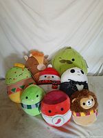 Group shot of all eight Squishmallows plush on white background