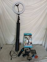 Entire lot showing floor ring light on stand, Bower kit box, accessories laid out