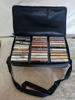 Open Case Logic bag showing two rows of cassettes