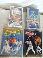Group shot of sealed Upper Deck NFL box, Fleer Ultra Baseball box, two Legends magazines