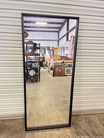 Front view of entire mirror showing full length and frame