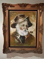 Frontal view of framed oil portrait