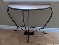Front view of half-moon console table showing full structure