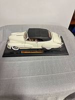 Top view of die-cast Cadillac on base