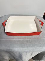 Top view of Dansk rectangular pan showing interior enamel and twin handles