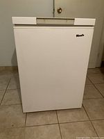 Full front view of the Woods chest freezer closed