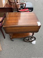 Top view of Knechtel tea cart showing drop-leaf design and finish