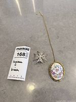 Pendant and brooch together for scale and lot overview