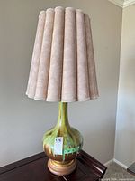 Full view of lamp with shade showing overall form and color