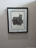 Full view of framed limited edition print on wall