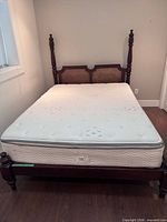 Full view of bed frame and mattress