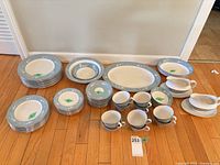 Full set laid out showing all stacks and serveware