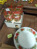 Four Culver glasses on original box with milk-glass plate in foreground