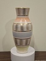 Front view of ceramic vase showing pattern and shape