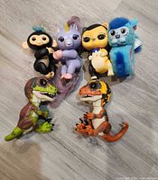 all six Fingerlings items arranged on floor