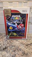 Front of case showing Super Mario Galaxy Nintendo Selects artwork