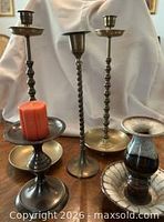 Group shot showing all five candle holders
