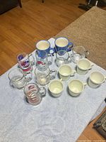 Group of all mugs laid out on towel