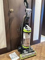 Full upright vacuum with hose, attachments and manual