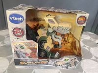 Front of boxed VTech Switch & Go T-Rex Off-Roader