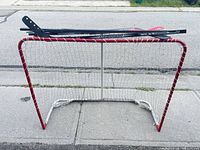 Front view of goal with sticks placed across crossbar