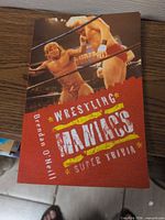 Front cover showing title and wrestling photo