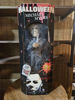 Front of boxed Michael Myers figure showing window and graphics