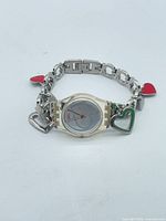 Full view of watch with heart-charm bracelet