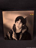 Front album jacket featuring portrait of Chaz Jankel