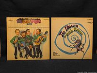 Both album fronts side by side for overview of lot
