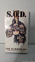 Front of VHS sleeve showing title, artwork and format