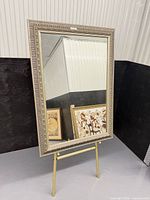 Front view of rectangular mirror showing full frame and glass