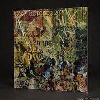 Oblique view of entire 36" square panel showing textured graffiti collage artwork