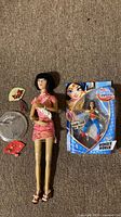Overall lot: loose Madame Alexander doll with accessories and boxed Wonder Woman figure