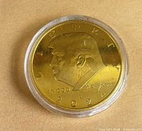 Obverse of coin showing Trump portrait and date 2024 in capsule