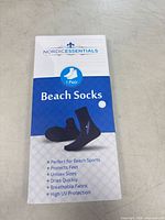 front of boxed Nordic Essentials beach socks