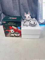 Figurine on styrofoam with original box