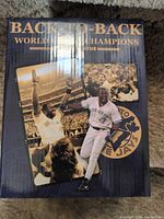 Front of boxed Joe Carter replica statue showing player image and title