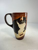 Full view of cat design on front of mug