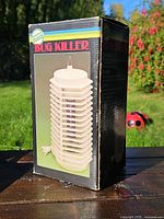 Front of retail box showing image of tower insect zapper