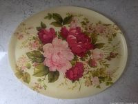 Full view of oval fiberglass tray showing floral design