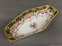 Overhead view of Nippon dish showing floral center and ornate gilt border