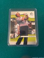 Front of 2012 SP Authentic Jack Nicklaus card in rigid sleeve