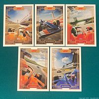 Fronts of five of the six Topps F1 Circuit Box Topper cards