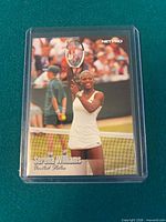 Front view of Serena Williams NetPro card #100 in plastic sleeve