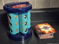 Bakurack tower beside stack of cards